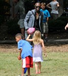 Seal plays baseball with Leni and Henry in the Park