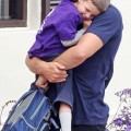 Tom Brady snuggling his eldest son John Edward while out in Malibu