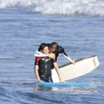 David Beckham and his oldest son, Brooklyn boogie boarding