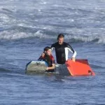 David Beckham and his oldest son, Brooklyn boogie boarding