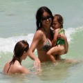 Adriana Lima, spends the day catching some rays and playing in the water with her adorable daughter Valentina in Miami, Florida