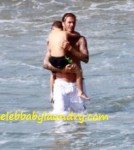 Victoria Beckham Pregnant on the Beach With David Beckham and Children - July 4th