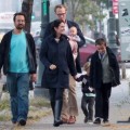 Jennifer Connely and Paul Bettany take a walk with a friend and their three children, Kai, Stellan and Agnes Lark