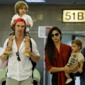 Matthew McConaughey and his wife Camila Alves arrive at LAX with their children Levi and Vida