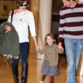Milla Jovovich, her husband Paul W.S. Anderson and daughter Ever arriving at the airport in Toronto, Canada