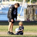 Russell Crowe kicks a soccer ball around with youngest son Tennyson
