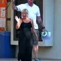 Pregnant Tori Spelling looks about to pop as she goes out with husband Dean McDermott in Los Angeles, CA on September 27, 2011