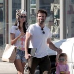 Supermodel Alessandra Ambrosio puts on a furry leopard hat as she walks with her husband Jamie Mazur and daughter Anja Louise Supermodel Alessandra Ambrosio puts on a furry leopard hat as she walks with her husband Jamie Mazur and daughter Anja Louise