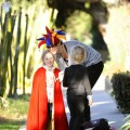 Marcia Cross makes some last minute adjustments to the Halloween costumes of her twin daughters, Eden and Savannah before they go into a party.