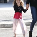 Katie Holmes and daughter Suri Cruise make their way out of their Pittsburgh, Pennsylvania hotel on October 6, 2011.