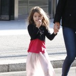 Katie Holmes and daughter Suri Cruise make their way out of their Pittsburgh, Pennsylvania hotel on October 6, 2011.