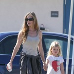 Denise Richards cheers on her daughter Lola during her soccer game while on the sidelines with her other daughter Sam