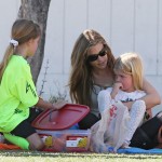 Denise Richards cheers on her daughter Lola during her soccer game while on the sidelines with her other daughter Sam