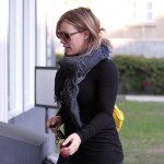 Hilary Duff made her way to a Pilates class in Los Angeles, California on October 26, 2011 wearing an all black tight outfit which showed off her growing baby bump.