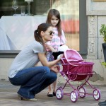 Katie Holmes takes her adorable daughter Suri for a walk as Suri pushes a play stroller for her panda bear stuffed animal in Pittsburgh 10-08-2011 Katie Holmes takes her adorable daughter Suri for a walk as Suri pushes a play stroller for her panda bear stuffed animal in Pittsburgh 10-08-2011