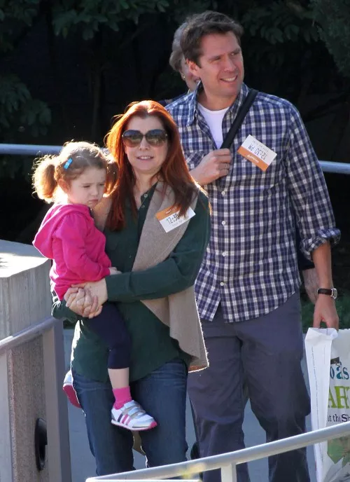 Alyson Hannigan enjoyed at day at The Skirball Cultural Center with her husband Alexis Denisof, their young daughter Satyana and her grandparents on November 22, 2011 in Los Angeles, California.