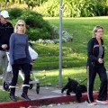 January Jones and her father Marvin spend a bit of time together as they take Jones' son Xander for a walk around the neighborhood.