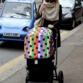 Kate Hudson and Matthew Bellamy wrap up warm as they stroll with their baby son, Bingham Hawn Bellamy, in London.