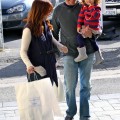 Alyson Hannigan and husband Alexis Denisof and their daughter Satyana went shopping in Brentwood, ca on December 4, 2011