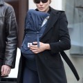 Carla Bruni-Sarkozy taking a stroll around Paris with her baby (December 6).