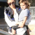 Kourtney Kardashian, Scott Disick and their son Mason at Barney's New York (December 10)