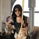 Selma Blair takes her adorable baby son Arthur on a carousel ride at the Santa Monica Pier