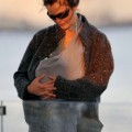 Keri Russell carries her newborn daughter Willa Lou in a baby carrier under her sweater as she heads to a carousel in Brooklyn with her family