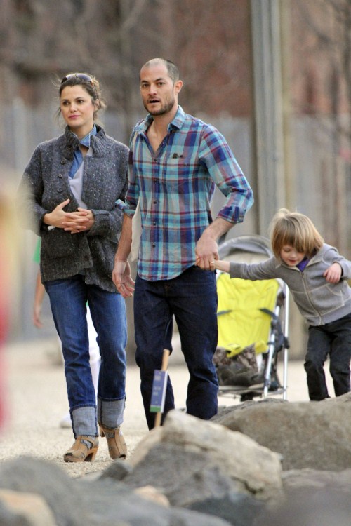 Keri Russell carries her newborn daughter Willa Lou in a baby carrier under