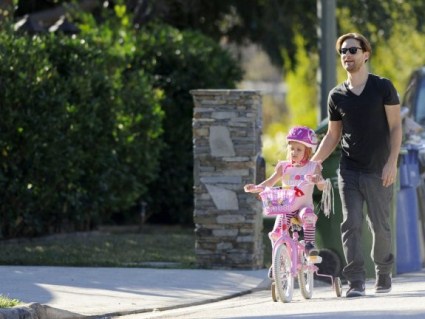 Tobey Maguire Takes Ruby For A Bike Ride