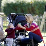 Ali Larter takes her adorable baby son Teddy to the park to play on the swings and in the sandbox 01-03-2012