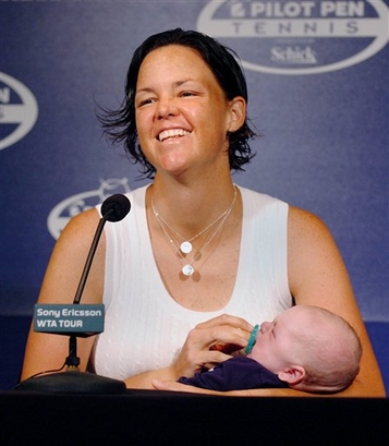 Lindsay Davenport holds her son Jagger Jonathan Leach as she speaks with reporters during a news conference before the Pilot Pen Tennis tournament in New Haven