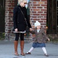 Michelle Williams and Matilda seen in Brooklyn, NYC. A very animated Matilda seen with fall leaves on the corner while they wait for the walk signal. Then Matilda makes gestures at the cars passing by. They stop off to get coffee and Matilda gets half a bagel.