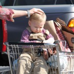 Ali Larter and her son Theodore MacArthur made their way back to the car after a shopping trip at the local Whole Foods Market in Los Angeles, California on February 1, 2012. Ali Larter and her son Theodore MacArthur made their way back to the car after a shopping trip at the local Whole Foods Market in Los Angeles, California on February 1, 2012.