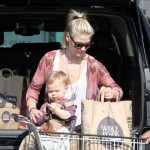 Ali Larter and her son Theodore MacArthur made their way back to the car after a shopping trip at the local Whole Foods Market in Los Angeles, California on February 1, 2012. Ali Larter and her son Theodore MacArthur made their way back to the car after a shopping trip at the local Whole Foods Market in Los Angeles, California on February 1, 2012.