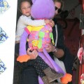 Model Gabriel Aubry picks up his daughter Nahla from school on February 8, 2012 in Los Angeles, CA. Nahla was barely visible behind the giant, purple stuffed animal she was carrying!