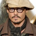 Johnny Depp, Amber Heard and Bruce Robinson attend the photocall for their film The Rum Diaries in Paris, France on November 8, 2011.