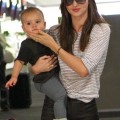 Model Miranda Kerr and her son Flynn Bloom catching a flight to Los Angeles in Sydney, Australia on February 28, 2012