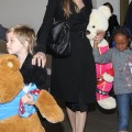 Angelina Jolie arriving on a flight from Amsterdam at LAX Airport with her daughters Shiloh and Zahara (March 15)