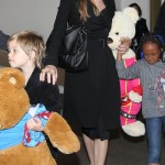 Angelina Jolie arriving on a flight from Amsterdam at LAX Airport with her daughters Shiloh and Zahara (March 15)