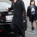 Actor Brad Pitt and son Maddox Jolie-Pitt buying a guitar and an amplifier at Guitar Center in Hollywood, CA on March 1, 2012