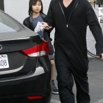 Actor Brad Pitt and son Maddox Jolie-Pitt buying a guitar and an amplifier at Guitar Center in Hollywood, CA on March 1, 2012