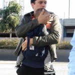 Orlando Bloom arrives at LAX Airport with his son Flynn to catch a flight out of town on March 4, 2012 in Los Angeles, CA. Orlando Bloom arrives at LAX Airport with his son Flynn to catch a flight out of town on March 4, 2012 in Los Angeles, CA.