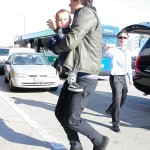 Orlando Bloom arrives at LAX Airport with his son Flynn to catch a flight out of town on March 4, 2012 in Los Angeles, CA. Orlando Bloom arrives at LAX Airport with his son Flynn to catch a flight out of town on March 4, 2012 in Los Angeles, CA.