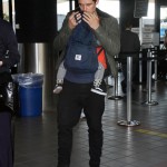 Orlando Bloom arrives at LAX Airport with his son Flynn to catch a flight out of town on March 4, 2012 in Los Angeles, CA. Orlando Bloom arrives at LAX Airport with his son Flynn to catch a flight out of town on March 4, 2012 in Los Angeles, CA.