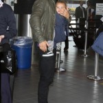 Orlando Bloom arrives at LAX Airport with his son Flynn to catch a flight out of town on March 4, 2012 in Los Angeles, CA. Orlando Bloom arrives at LAX Airport with his son Flynn to catch a flight out of town on March 4, 2012 in Los Angeles, CA.