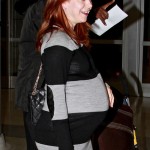 Alyson Hannigan shows off a huge baby bump as she arrives at JFK Airport in New York with husband Alexis Denisof and daughter Satyana. Alyson Hannigan shows off a huge baby bump as she arrives at JFK Airport in New York with husband Alexis Denisof and daughter Satyana.