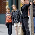 Jude Law has a busy afternoon as he takes his children Rudy and Iris street art shopping in Soho, New York City
