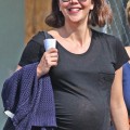 Pregnant actress Maggie Gyllenhaal is all smiles as she is seen out for a walk with her mother Naomi Gyllenhaal in New York City, NY on March 23, 2012.