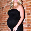 Kim Zolciak is evening things up with another boy 0503