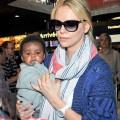 Charlize Theron with her son Jackson at LAX airport in Los Angeles, CA May 7